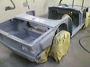 Car body being painted 